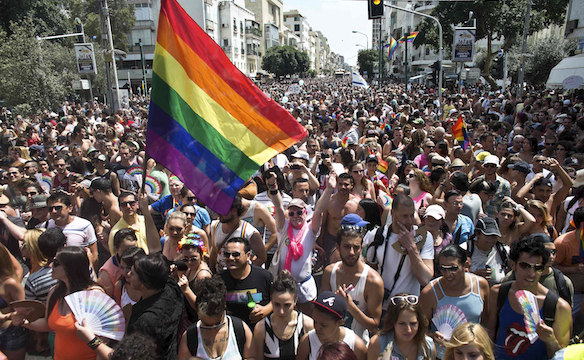 People take part at the annual Gay Pride parade in Tel Aviv