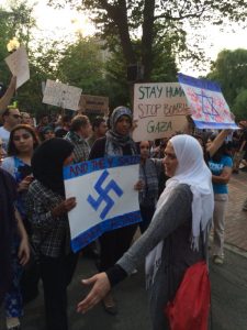 An offensive sign held by anti-Israel protesters. 
