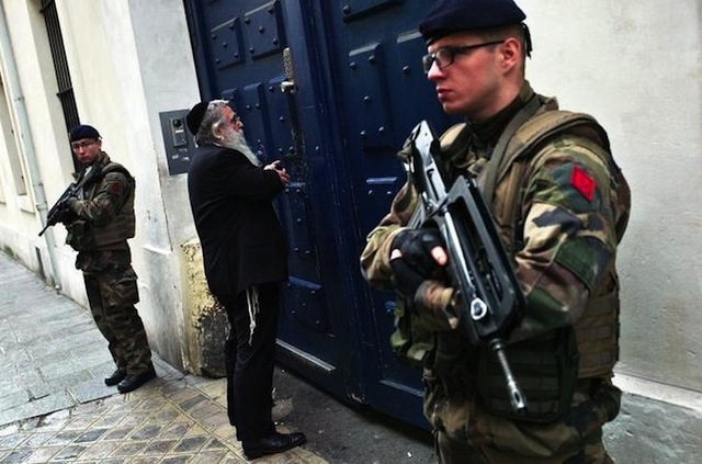 French soldiers stationed outside a Jewish school in Paris. Source theblaze.com