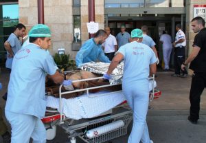 One-of-the-injured-Syrian-from-the-civil-war-in-Syria-being-transferred-to-the-Ziv-Medical-Center-photo-by-Simon-Haddad-1024x710