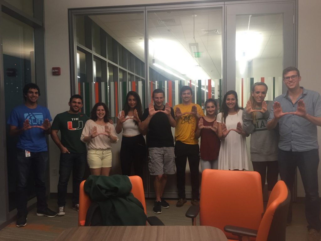 Tatiana, though a graduate of Florida State University, a state rival of UM, is happy to do UM's signature "U" with the students of EMET Israel!
