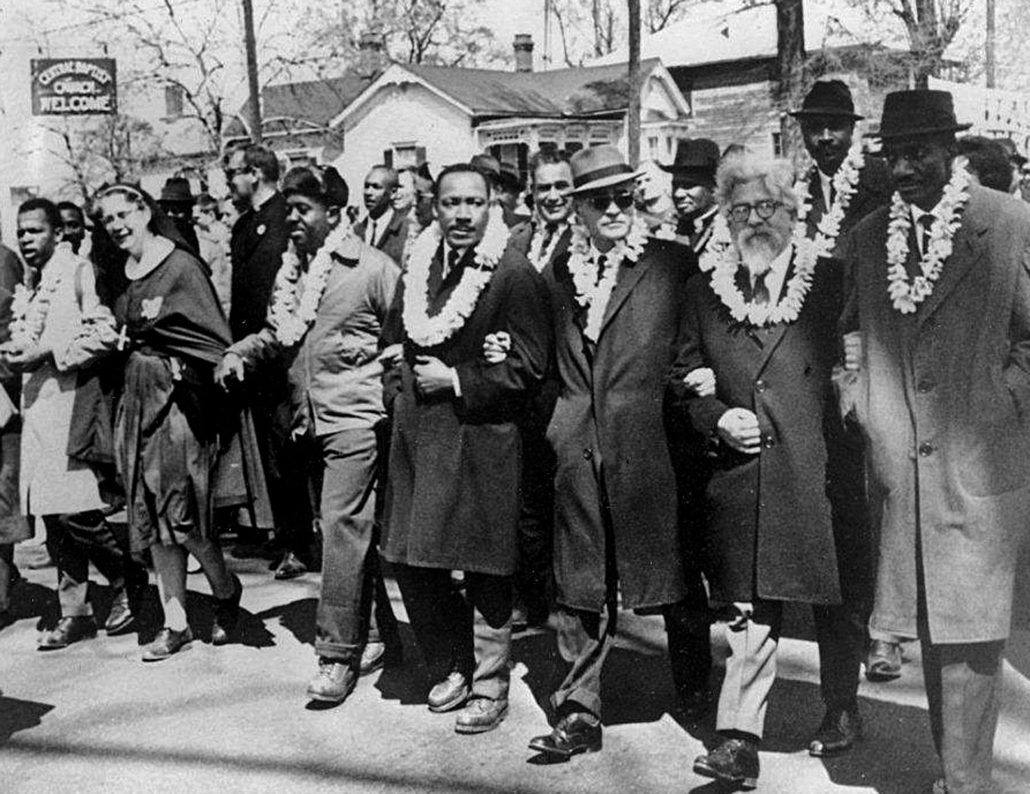 Dr. King marching with Dr. Ralph Bunche and Rabbi Abraham Joshua in a 1965 protest. Source: jewishcurrents.org