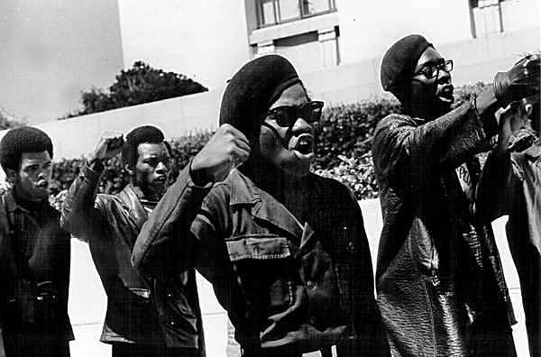 Black Panther members in the 1960's. Source: hiphopwired.com